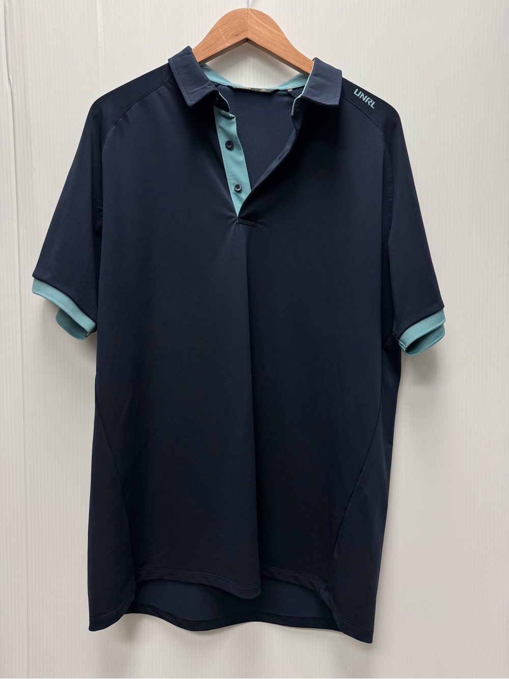 UNRL Men’s Navy Polo with Teal Trim